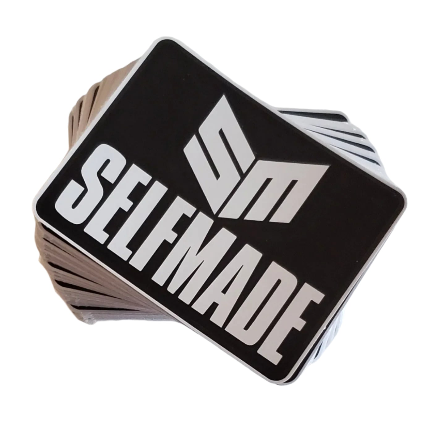 Stack of playing cards with 'SELFMADE' text on a white background