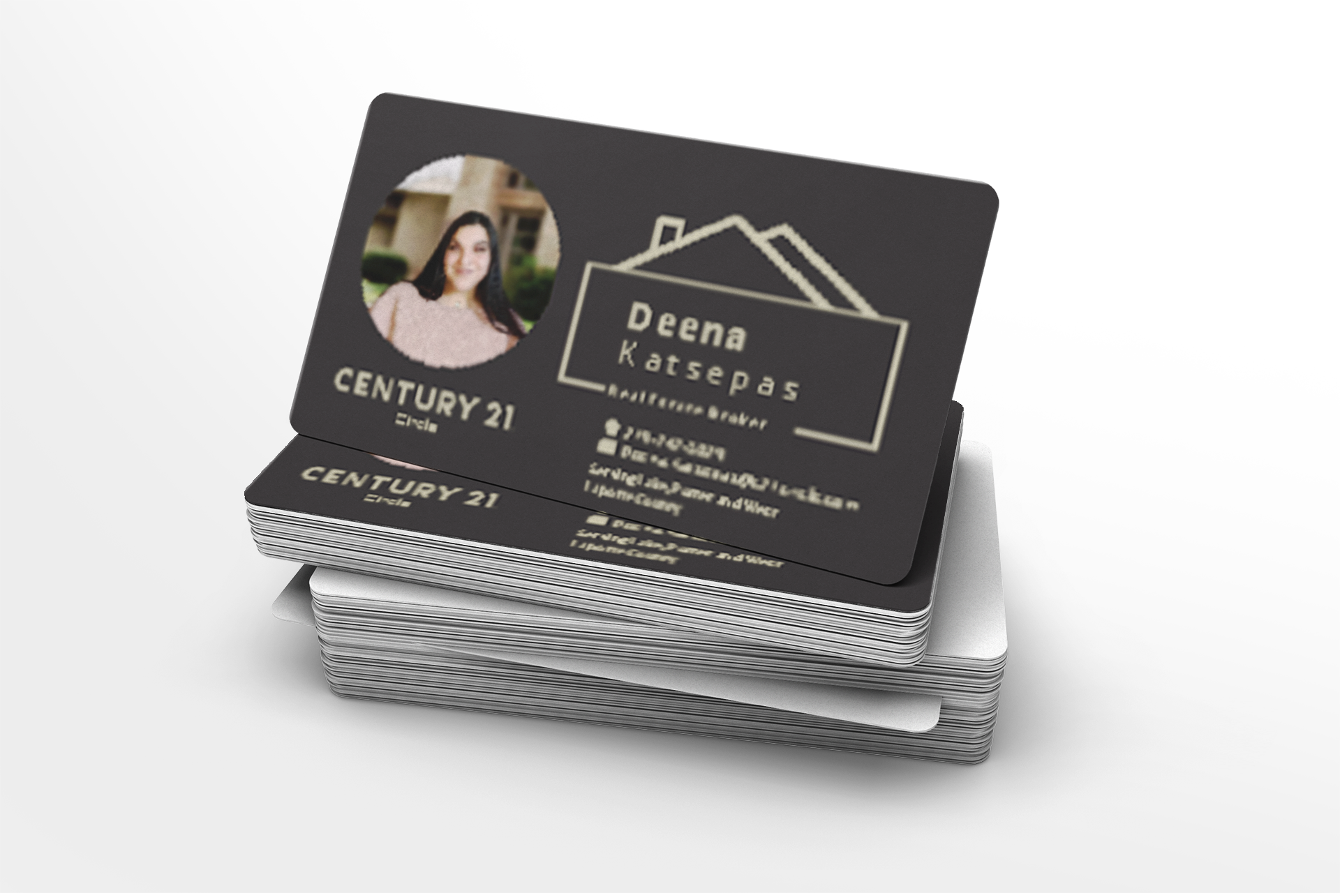 Stack of business cards with a real estate agent's photo and name on a white background
